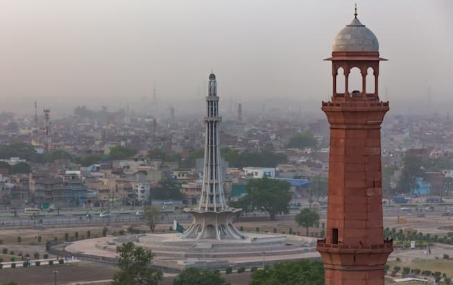 Minar-e-Pakistan and the Badshahi Mosque minaret above Lahore